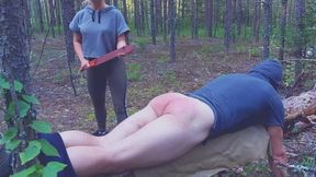 Spanking husband in the forest