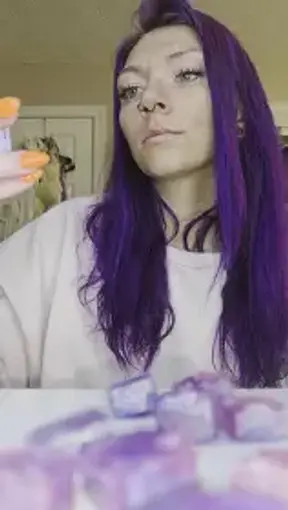 Curvy Adult With Vivid Purple Hair Teases in Bedroom Solo