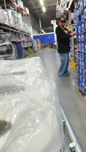 Showing her breasts in the supermarket