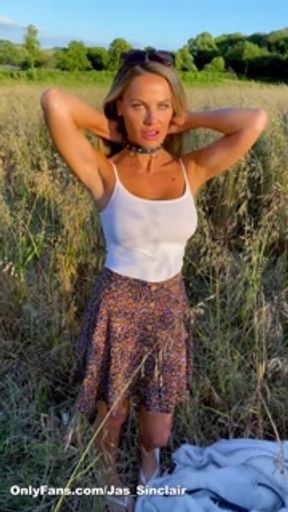 Anyone can see me as I gag myself and finger myself in a public field.