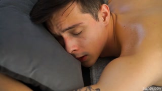 Jackie starts using both hands to massage Miles' uncut cock