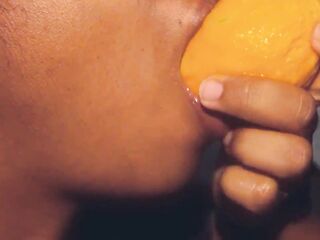 Hawt throat black playing with a mango