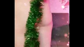 Playful femboy bending forward in short denim skirt