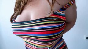 MILF showing off her huge boobs with tan lines