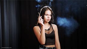 18 years old Tanya is smoking 120mm cigarette