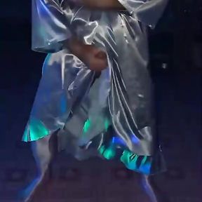 Dancing in a silver gray pajama