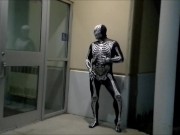 nighttime skeleton jerking off in front of outside doors