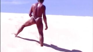 Beach Striptease: Tanned Hunk Bares All