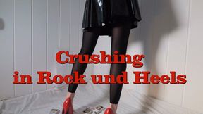 Crushing in skirt and red heels
