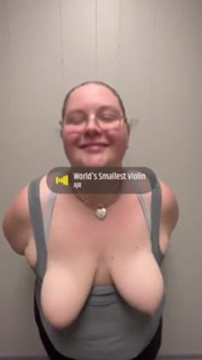 Pale bbw women bouncing her tittys in a public restroom