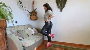 one shoe hopping in leather pants m0