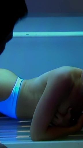 A Sexy Blonde Girl Gets Fucked Hard in the Ass During a Solarium Session