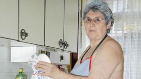 Gorgeous old lady Gerlinde is using a nice cucumber as a dildo