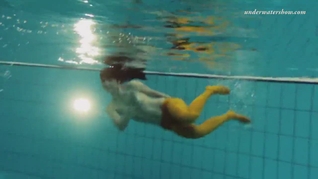 Sexy orange stockings of Markova underwater