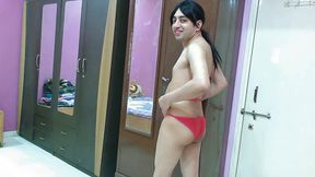 Beautiful sissy crossdresser femboy Sweet Lollipop in a cute pink-white bra-pantie.