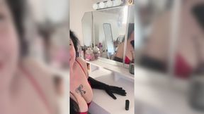 Dominant Mistress in Leather teaches submissive Femme to Worship Big Tits
