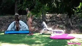 Enjoying holidays with a bottle and a tent