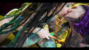 Two tattooed babes get their holes gaped wide with big toys