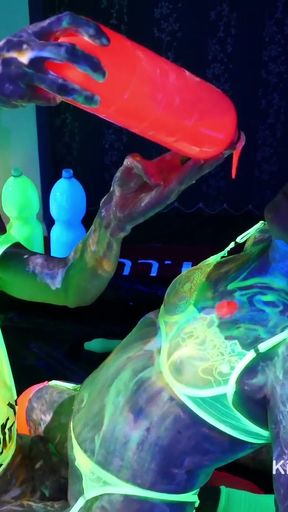 Wet and Messy glowing UV slime colourful alien goo play   Clip 2