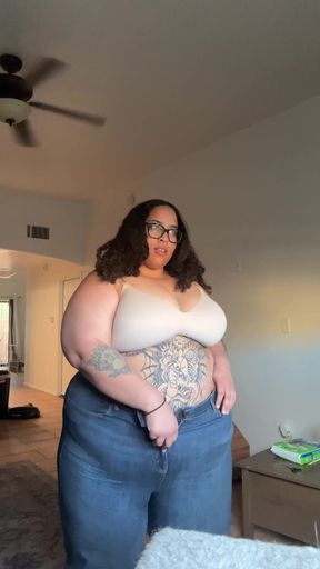 Curvy BBW shows off her bouncy big tits and belly in a group setting