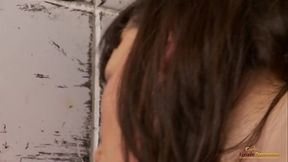 Pussy rubbing gets put on pause once the brunette finds a cock in the gloryhole