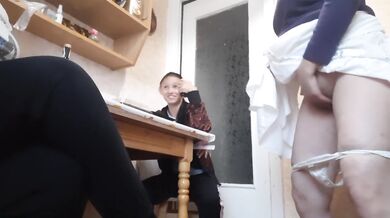 Our third girlfriend began to leak and she finished in the kitchen to our dirty talk