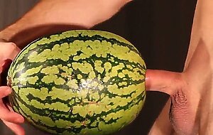 Muscular Stud Fucks and Cums on Watermelon
