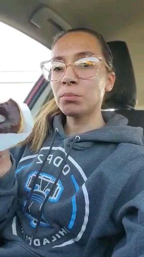 Just me taking a bite of a doughnut