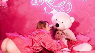 Two hot friends in a pink room masturbating hot with their toys