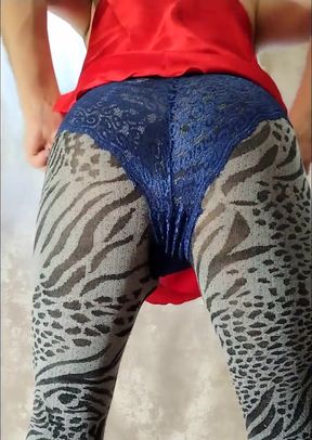 Sissy in tights and a nightgown tries on different panties