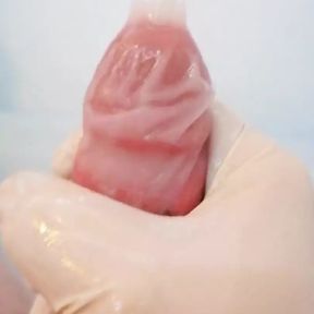 Watch me cum in a Condom with lubed LATEX GLOVES