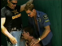 Two hunky policemen get their meat blown by a submissive sucker