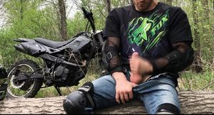 Handsome BIKER while riding a MOTORCYCLE in the forest JERKS OFF and CUMS in public