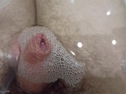 Enjoy pissing inside water with foam. Uncut Close-up cock