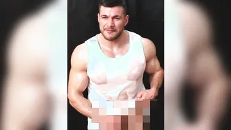 Muscular Oiled Stud Teases in Vest During Solo Massage