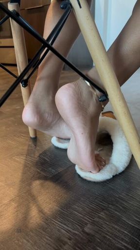 Under the table Ugg slipper play