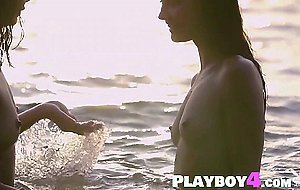 Sexy teen babe enjoyed on the beach with her friend