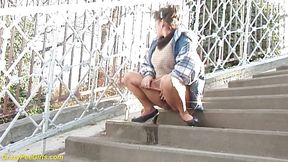 Peeing on outdoor stairway