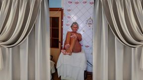 Hot housewife Lukerya at home in the kitchen.