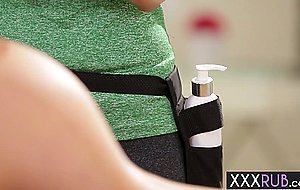 Hot blonde client enjoys hot massage by a sexy redhead