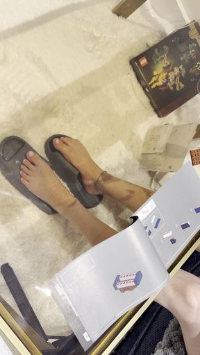 My Feet on Display While I Build Lego
