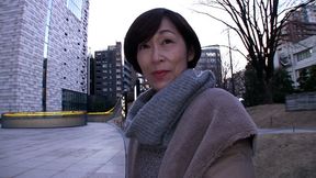 50-something mature woman with short hair goes down on a lady
