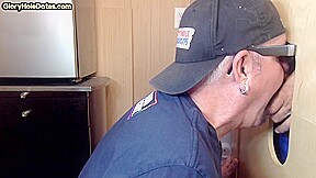 Gloryhole gay enjoys jerking big dick while sucking it