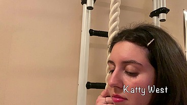 Skinny russian babe Katty West makes exercises on the wall-mounted ladder