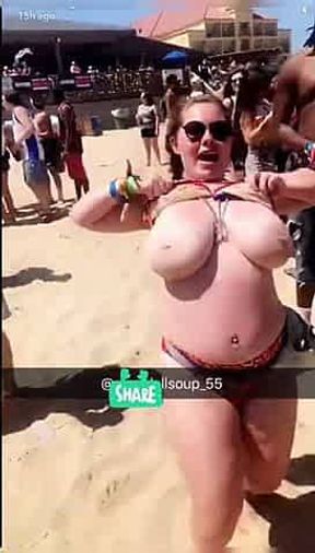 Flashing huge tits at beach