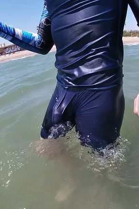 Surfer Gets Erect in His Lycra for the Pleasure of the People