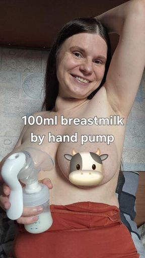 Breastmilk hand pump full bottle