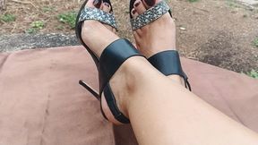 A man worshipping the feet in high heels of the beautiful woman (3)