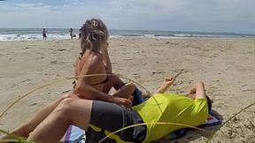 Hot milf guides stranger to climax&#x1F680; with intense handjob by the shore