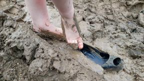 Wet and muddy high heels shoes, high heels stuck in mud, muddy high heels, shoes wrecked